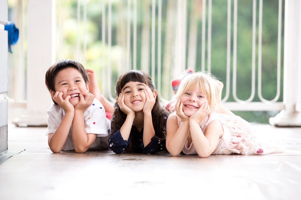 three children smiling