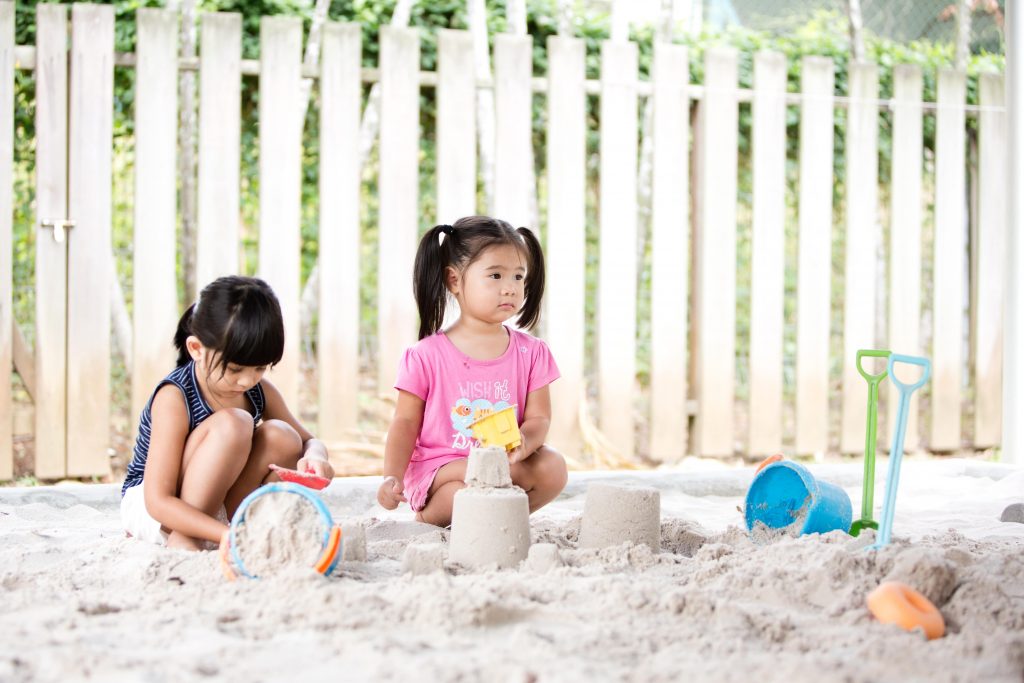two girls at sandplay