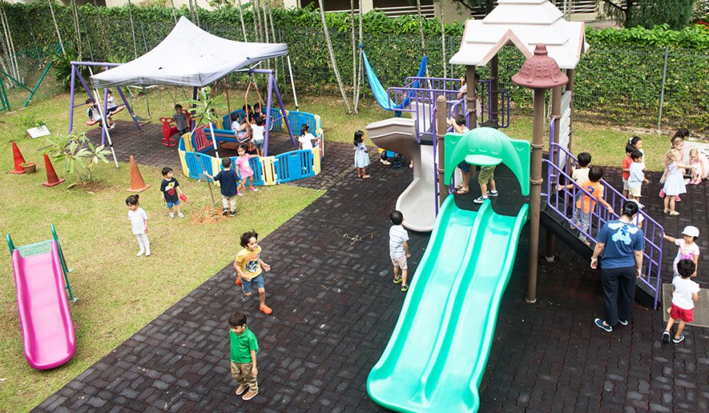 Preschoolers having fun at playground