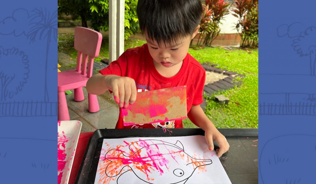 preschooler engaged in an art and craft activity