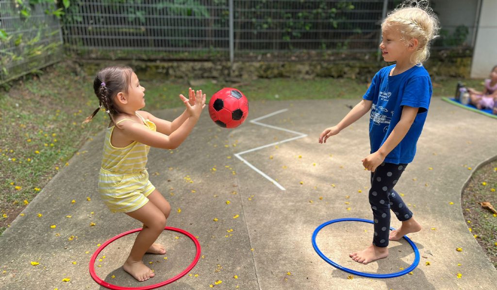Preschoolers engaged in an outdoor sports activity