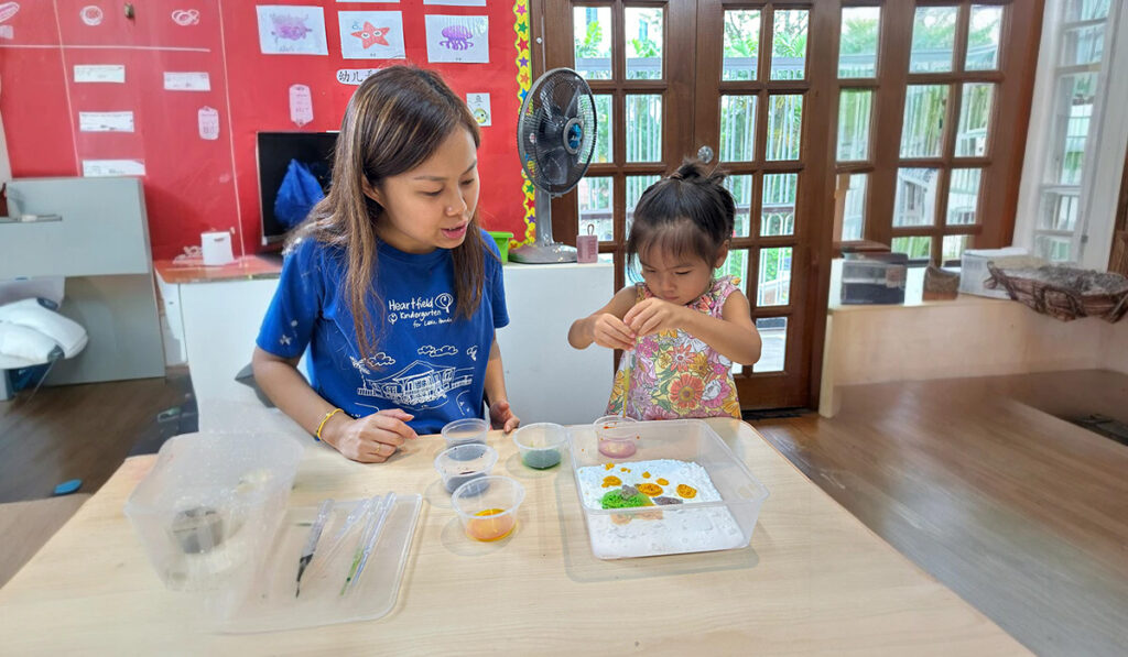 Heartfield preschooler engaged in a hands-on activity